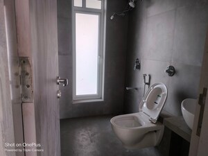 Bathroom in 3 BHK Apartment at Shreenathji Celestial Heights, Malad West – for Rent