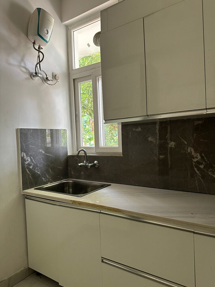 Kitchen, emaar-mgf-emerald-hills 3.5 Bedroom 1380 Sq.Ft. Builder Floor In Sector 65 Gurgaon 9334436