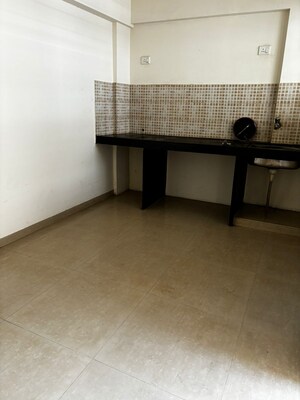 Kitchen in 2 BHK Apartment at Jalan Aura County Pune, Wagholi – for Rent