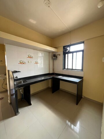 Kitchen in 1 BHK Apartment at Wadgaon Sheri – for Rent