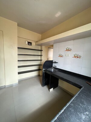 Kitchen in 1 BHK Apartment at Wadgaon Sheri – for Rent