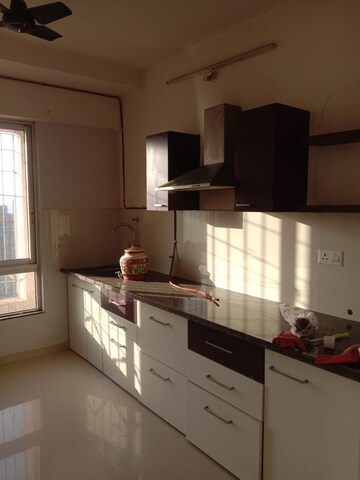 Kitchen in 1 BHK Apartment at Puranik Rumah Bali, Ghodbunder Road – for Rent