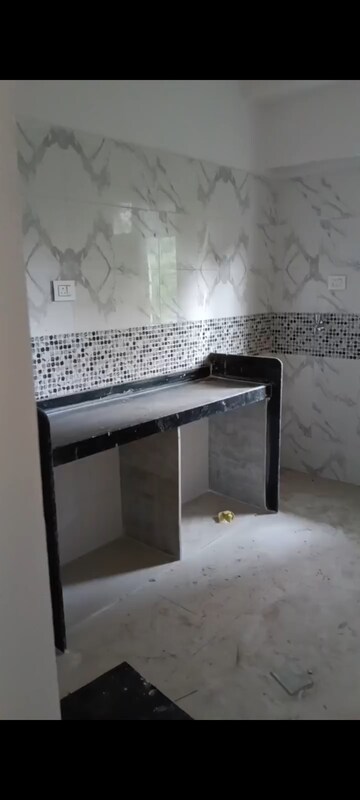 Kitchen in 2 BHK Apartment at DGS Sheetal Tapovan, Malad East – for Rent