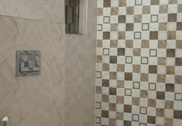 Bathroom in 4 BHK Builder Floor at Omaxe Green Meadow City, Alwar Bypass Road – for Sale