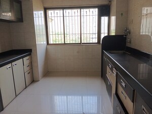 Kitchen in 3 BHK Apartment at Happy Valley, Manpada – for Rent