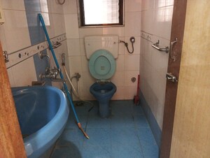 Bathroom in 3 BHK Apartment at Happy Valley, Manpada – for Rent