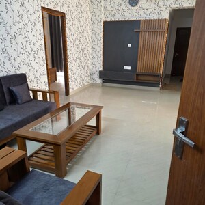 Living Room in 3 BHK Apartment at Sushant Golf City – for Sale