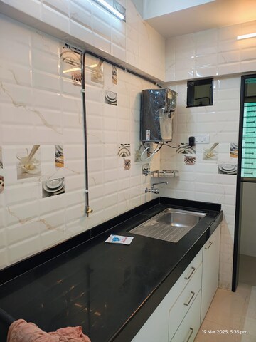Kitchen in 3 BHK Apartment at Neha Heena Gaurav Jewels, Goregaon East – for Rent