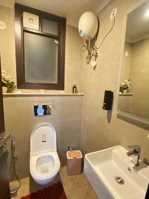 Bathroom in 4 BHK Builder Floor at Palam Vihar Residents Association, Palam Vihar – for Rent