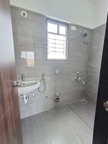 Bathroom in 2 BHK Apartment at Kedar Krishna Kunj Residency, Vadgaon Budruk – for Sale