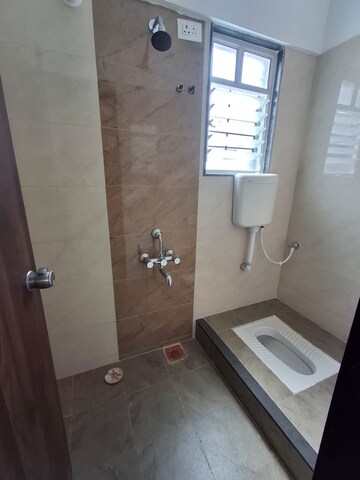 Bathroom in 2 BHK Apartment at Kedar Krishna Kunj Residency, Vadgaon Budruk – for Sale