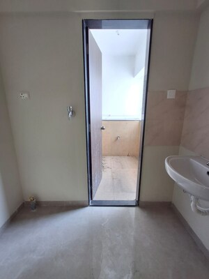 Bathroom in 2 BHK Apartment at Kedar Krishna Kunj Residency, Vadgaon Budruk – for Sale