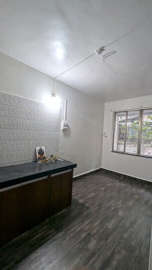 Bedroom in 1 BHK Apartment at Kundale Patil Paradise, Hingne Khurd – for Rent