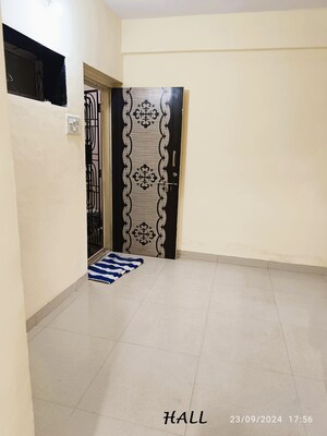 Living Room in 2 BHK Apartment at Jatayu CHSL, Mira Road East – for Rent