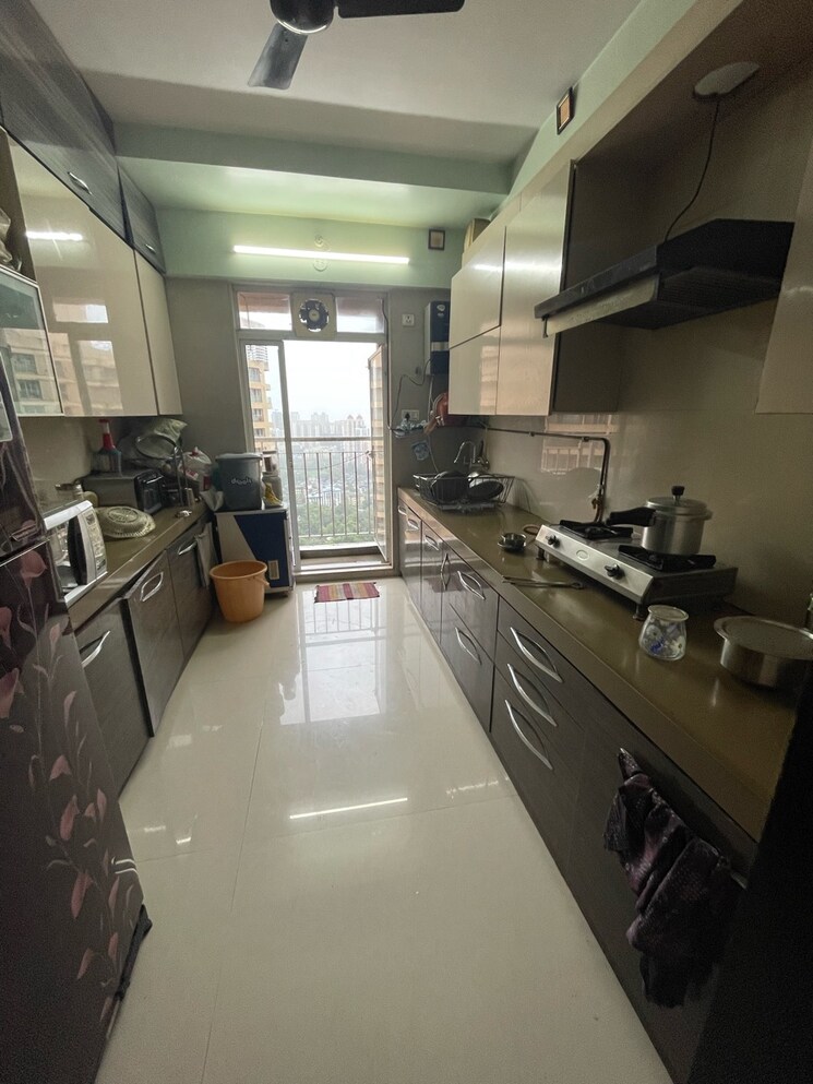Kitchen, dosti-imperia-phase-iii 2 Bedroom 880 Sq.Ft. Apartment In Ghodbunder Road Thane 9336225