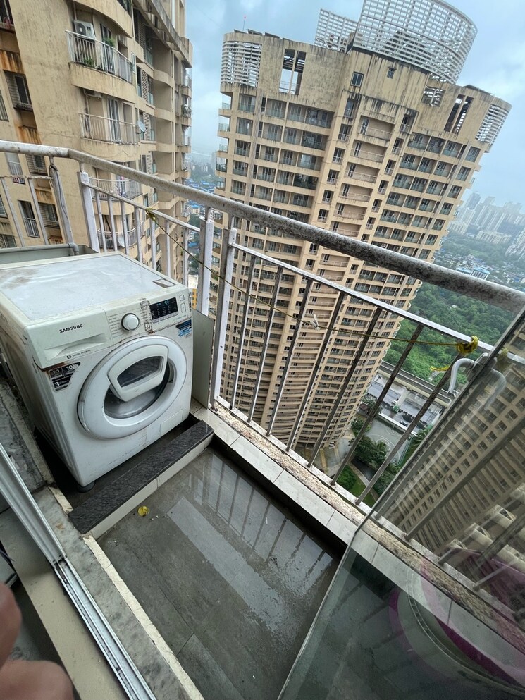 Balcony, dosti-imperia-phase-iii 2 Bedroom 880 Sq.Ft. Apartment In Ghodbunder Road Thane 9336225