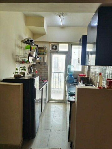 Kitchen in 2 BHK Apartment at La Residentia, Tech Zone 4 Greater Noida – for Rent