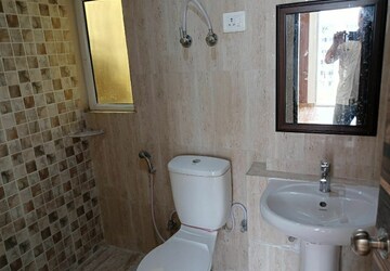 Bathroom in 3 BHK Apartment at Mahagun Mantra I, Sector 10 Greater Noida – for Rent