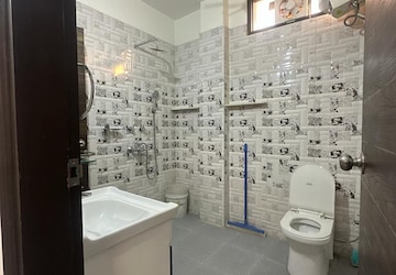Bathroom in 4 BHK Apartment at Chattarpur – for Sale