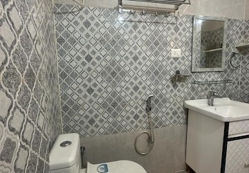 Bathroom in 4 BHK Apartment at Chattarpur – for Sale