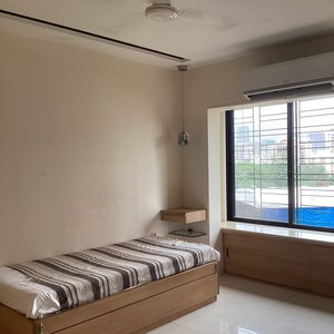 Bedroom in 3 BHK Apartment at Lokhandwala Green Acres, Lokhandwala Complex – for Rent