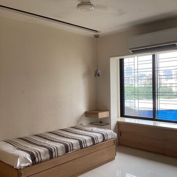 Bedroom in 3 BHK Apartment at Lokhandwala Green Acres, Lokhandwala Complex – for Rent