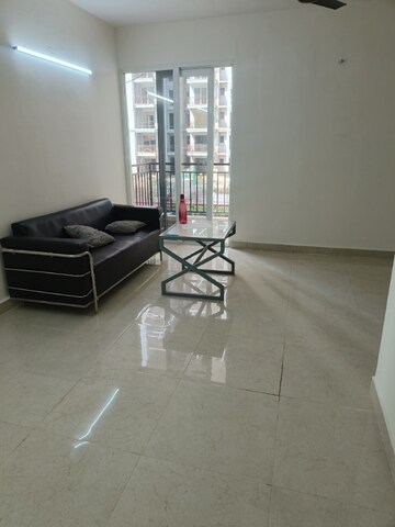 Living Room in 2 BHK Apartment at Signature The Millennia 3, Sector 37d – for Rent