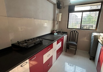 Kitchen in 2.5 BHK Apartment at Sudarshan Sky Garden, Ghodbunder Road – for Rent