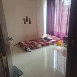 Bedroom in 1 BHK Apartment at Jhamtani Vision Ace Phase 1, Mumbai Bangalore Highway – for Rent