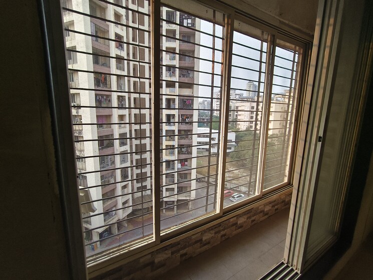 Balcony, cosmos-enclave 1 Bedroom 650 Sq.Ft. Apartment In Kasarvadavali Thane 9336517