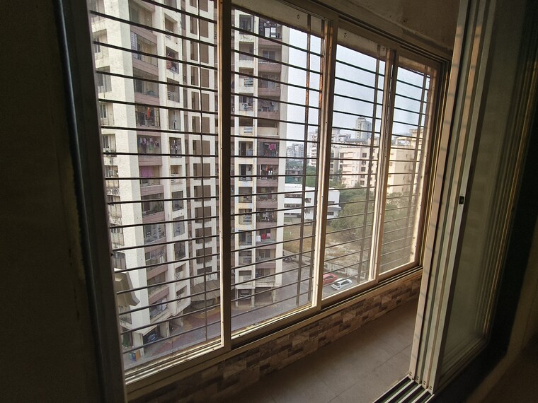 Balcony, cosmos-enclave 1 Bedroom 650 Sq.Ft. Apartment In Kasarvadavali Thane 9336517