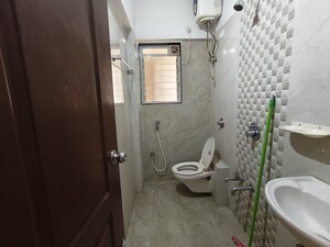 Bathroom in 1 BHK Apartment at Cosmos Enclave, Kasarvadavali – for Rent