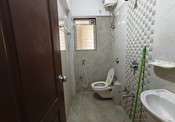 Bathroom in 1 BHK Apartment at Cosmos Enclave, Kasarvadavali – for Rent