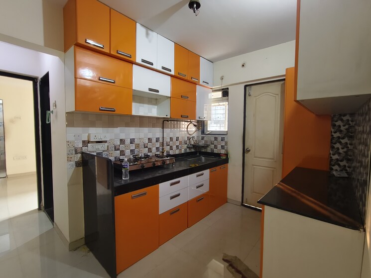 Kitchen, cosmos-enclave 1 Bedroom 650 Sq.Ft. Apartment In Kasarvadavali Thane 9336517