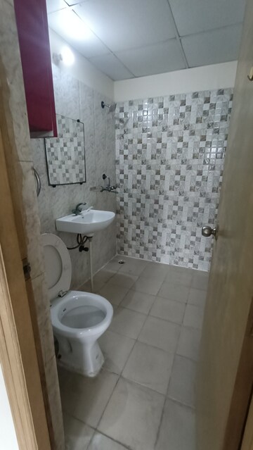 Bathroom in 2 BHK Apartment at Antriksh Golf View, Sector 78 – for Rent