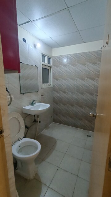 Bathroom in 2 BHK Apartment at Antriksh Golf View, Sector 78 – for Rent