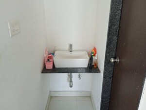 Bathroom in 2 BHK Apartment at Eklavya Skylark, Kharadi – for Rent