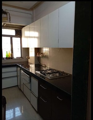 Kitchen in 2 BHK Apartment at Shree Siddhivinayak, Owale – for Rent