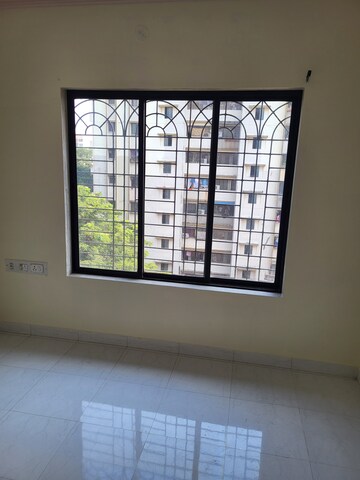 Room in 2 BHK Apartment at Swapna Surabhi CHS, Santacruz East – for Rent