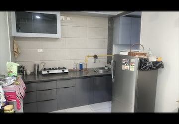 Kitchen in 3 BHK Apartment at Sun Skyview, Shela – for Rent