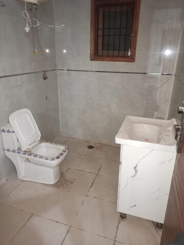 Bathroom in 3 BHK Apartment at Chattarpur – for Sale