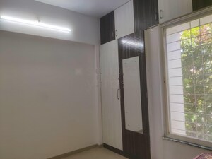 Room in 2 BHK Apartment at Spandan Sparsh CHS, Wagholi – for Rent
