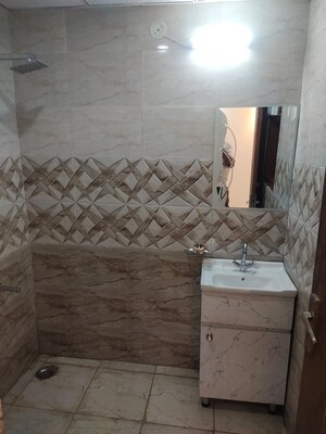 Bathroom in 2 BHK Apartment at Chattarpur – for Sale
