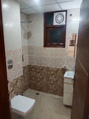 Bathroom in 2 BHK Apartment at Chattarpur – for Sale