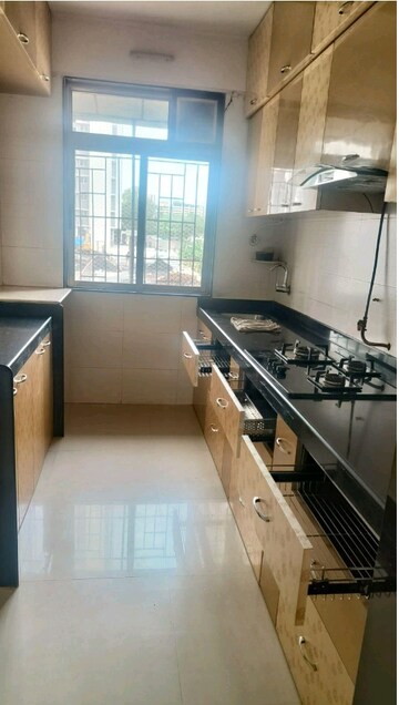 Kitchen in 2 BHK Apartment at Sheth Vasant Athena, Laxmi Nagar – for Rent