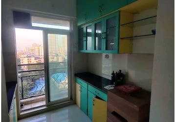 Kitchen in 2 BHK Apartment at Vijay Galaxy, Waghbil – for Rent