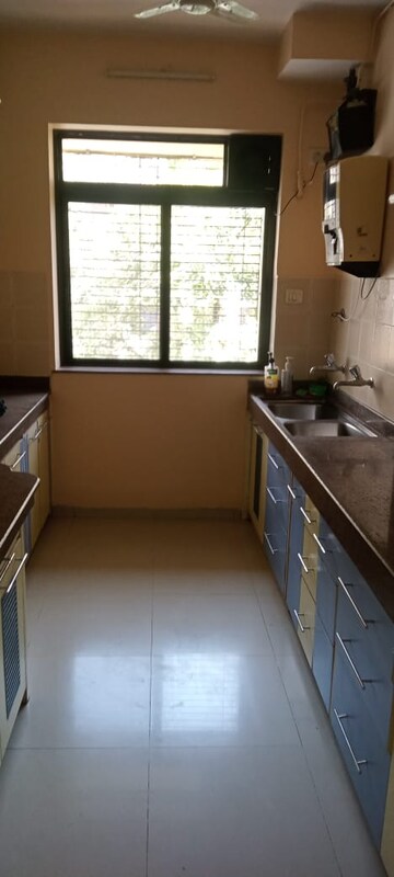 Kitchen in 2 BHK Apartment at Sheth Vasant Marvel, Borivali East – for Rent