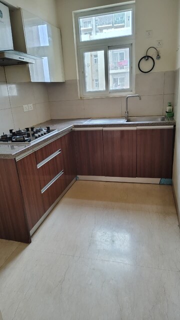 Kitchen in 3 BHK Apartment at Puri Aanandvilas, Sector 81 – for Rent
