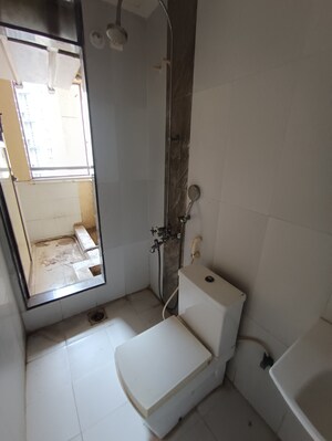 Bathroom in 1 BHK Apartment at Ajmera Yogi Dham Phase III, Kalyan West – for Rent
