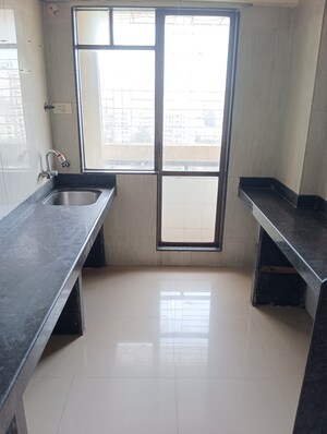 Kitchen in 1 BHK Apartment at Ajmera Yogi Dham Phase III, Kalyan West – for Rent